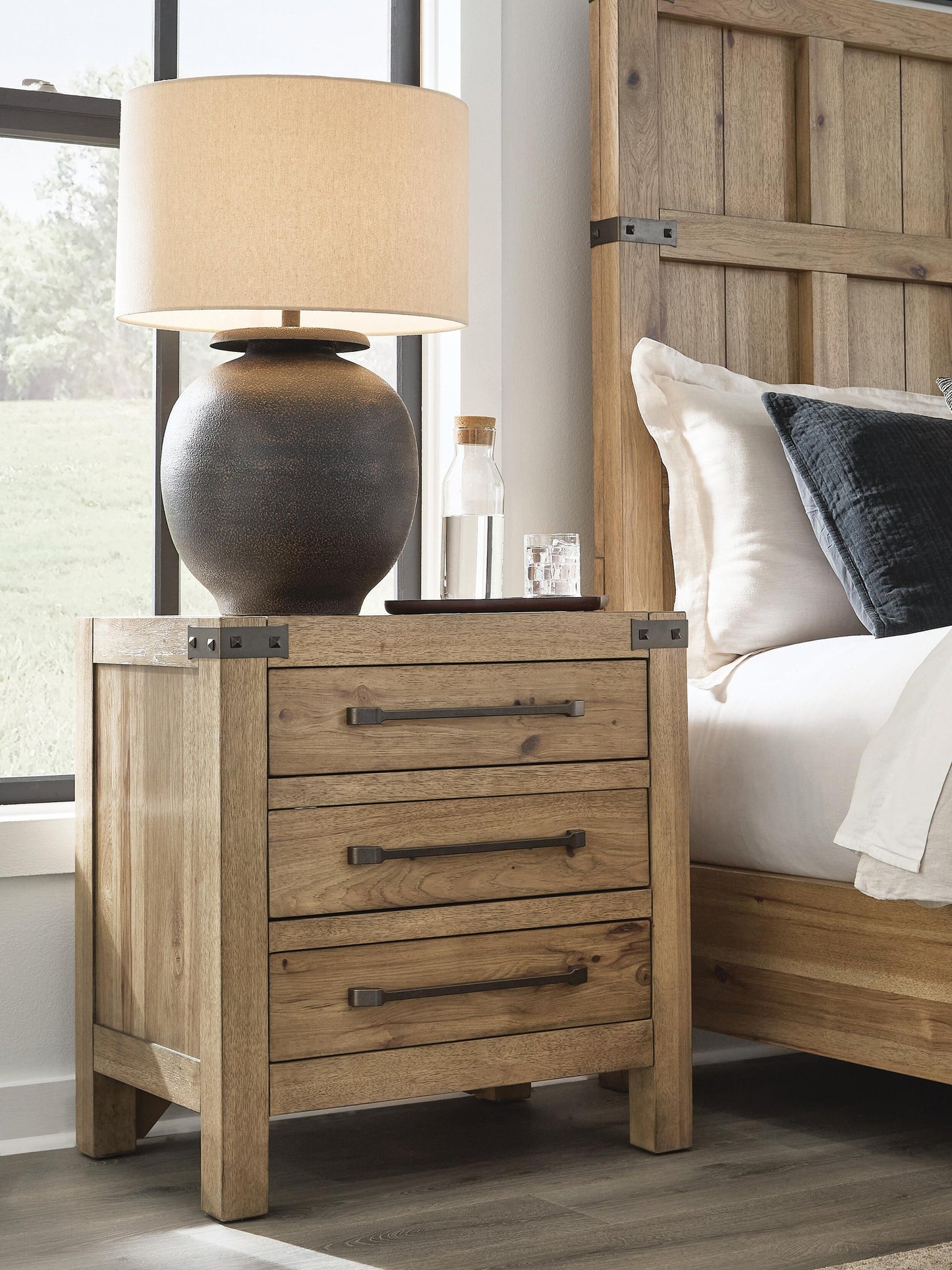 Ridgester Three Drawer Night Stand